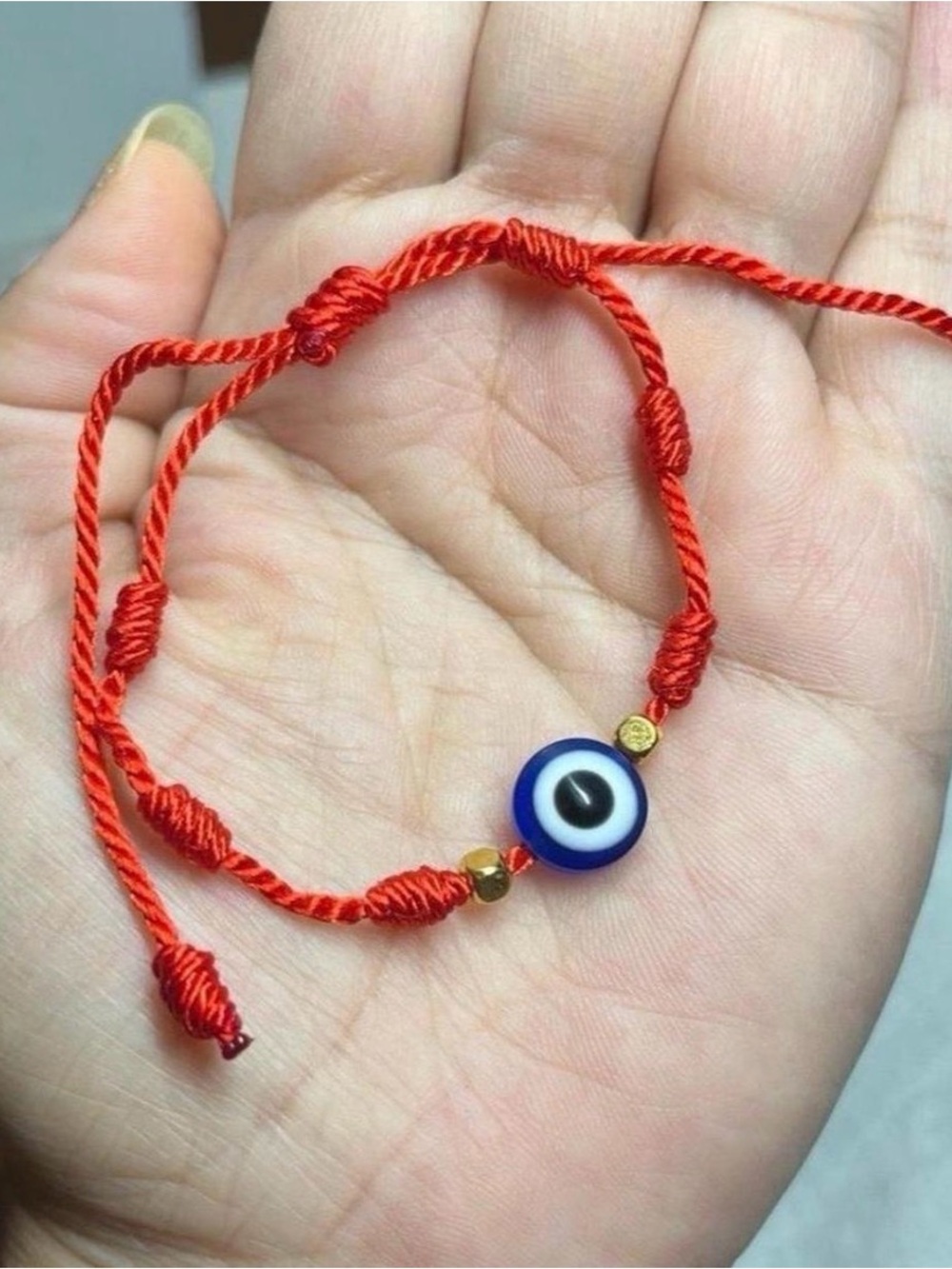 Red Thread Bracelet with Blue Evil Eye Charm